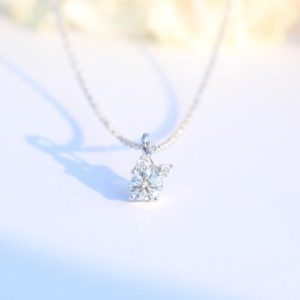 Necklace with single diamond pendant