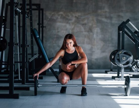 young-fitness-woman-with-slim-type-body-black-sportive-clothes-is-gym